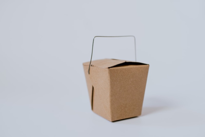 Kraft amenity box with printed sleeve