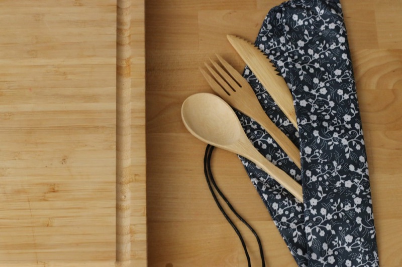 Rectangular bamboo serving board on a neutral background